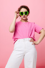 teenager girl model fashion green glasses pink t-shirt decoration posing