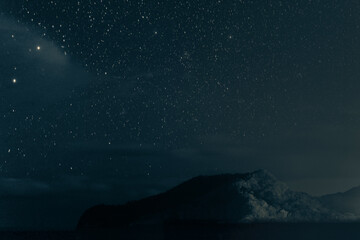 Fototapeta premium Scenic view of a starry night sky