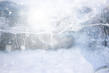 Obraz na płótnie Canvas ice texture cracks baikal, abstract background winter ice transparent blue