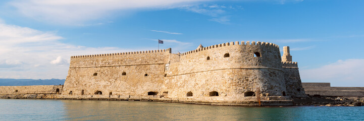 Panoramic view of Venetian harbor Koules or Castello a Mare fortress - symbol of Heraklion town at Crete, Greece. Sightseeing and landmark of Greek island of Crete