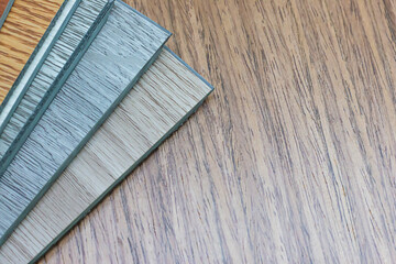 Examples of ready-made vinyl flooring for interior work.