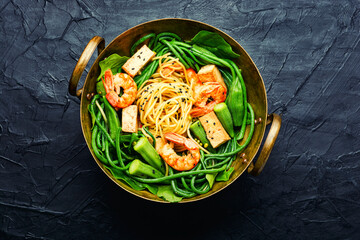 Tasty salad with seafood and vegetables.