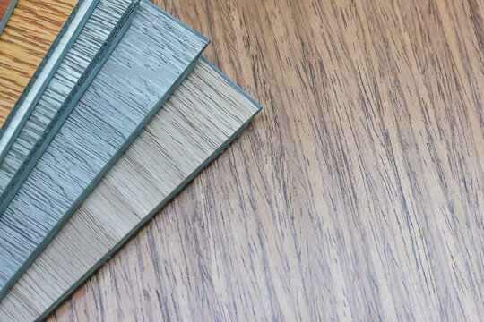 Examples of ready-made vinyl flooring for interior work.