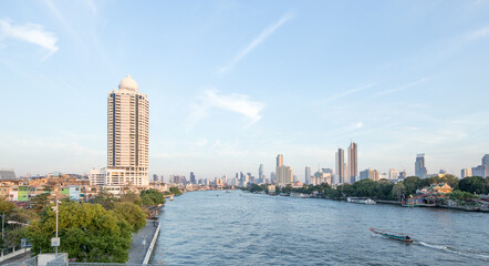 Fototapeta na wymiar Chao Phraya River and river side view in Bangkok, view from Phra Pokklao Bridge.