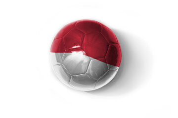 realistic football ball with colorfull national flag of indonesia on the white background.