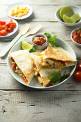 Homemade quesadilla with chicken and tomatoes