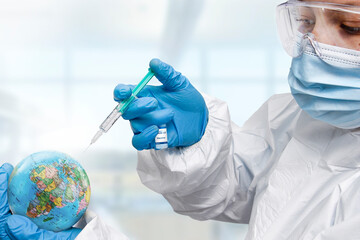Doctor hand wearing glove injecting syringe of Coronavirus vaccine concept, syringe of vaccine and...
