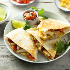 Homemade quesadilla with chicken and tomatoes