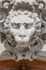 Ancient decoration element of scary lion head in downtown historical center of Dresden, Germany