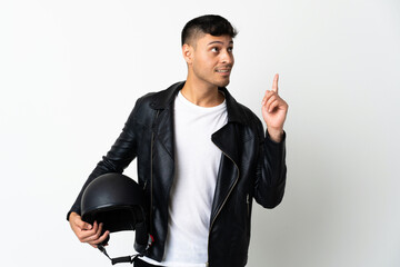 Man with a motorcycle helmet isolated on white background pointing up a great idea