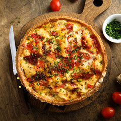 Homemade chicken quiche with tomatoes and pepper