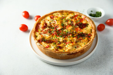 Homemade chicken quiche with tomatoes and pepper