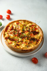 Homemade chicken quiche with tomatoes and pepper