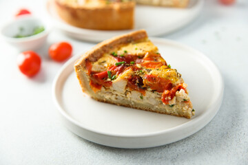 Homemade chicken quiche with tomatoes and pepper