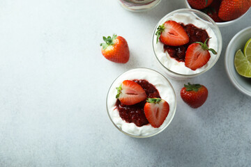 Homemade berry trifle with almond flakes