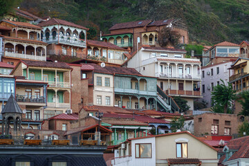 Fototapeta na wymiar Old houses on mountain slope