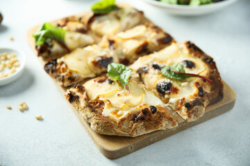 Homemade pizza with pear and blue cheese