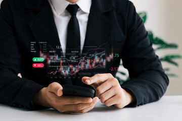 Businessmen work with stock market investments using tablets to analyze trading data. smartphone with stock exchange graph on screen. Financial stock market.