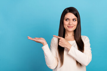 Photo of young woman look indicate finger product offer select recommend discount isolated over...
