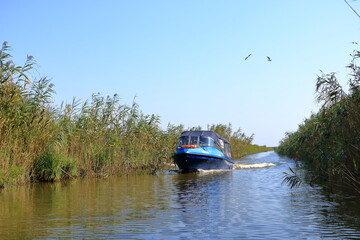 Boat for tourists in the Danube Delta in Romania