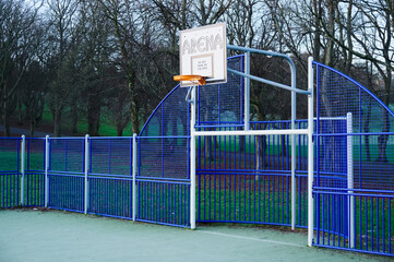 Basketball court outdoors in public play park