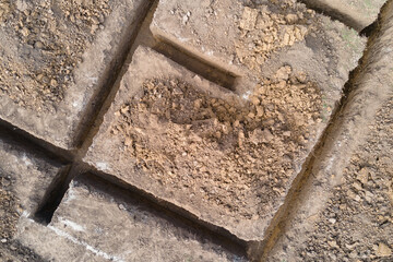 Dug out trench for building works of new house concrete foundation on construction site