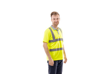 A middle-aged white man wearing a green uniform t-shirt standing over an isolated white background. He looks happy and smiles, a smirk on his face. Worker and builder concept.