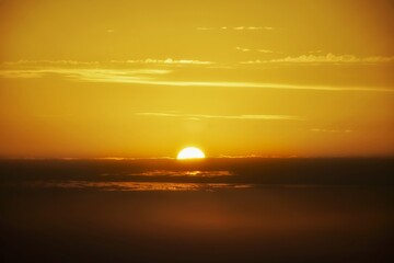 The Sunset over clouds