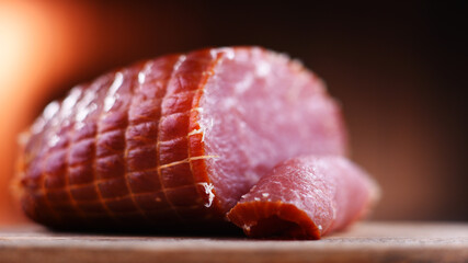 Piece of smoked ham. Meatworks product