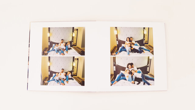 the pages of a photobook with a family pregnancy photo shoot. 