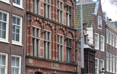 Amsteram Nieuwezijds Voorburgwal Street Brick House Facades Close Up, Netherlands