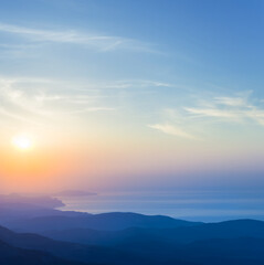 Obraz premium view from mountain ridge to sea bay at the early morning, natural sunrise scene