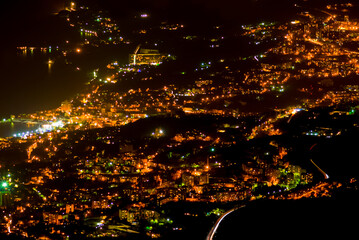 view from above to night city lightened by lanterns, night city scene