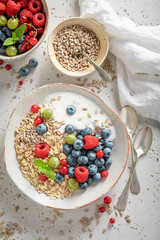 Tasty oats with fruits and sunflower seeds.