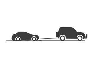 SUV pulls the car out of the pit. Towing