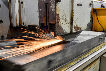Mechanical processing of metal products. Grinding and finishing of metal on a surface grinder with...