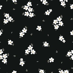 Fototapeta na wymiar Seamless vintage pattern. White flowers, gray leaves. Black background. vector texture. fashionable print for textiles, wallpaper and packaging.