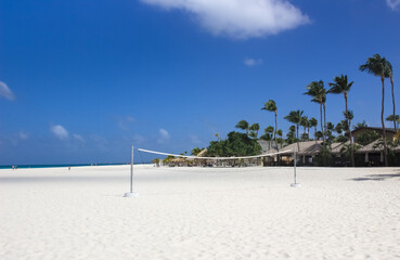 White sand Aruba beach with volleyball net