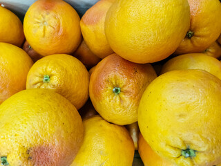 texture of oranges on market showcase. artistic blur, selective focus