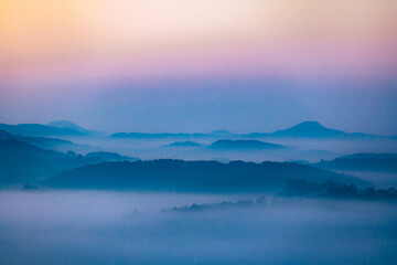 Fototapeta na wymiar Beautiful arial landscape of amazing mountain in fog.