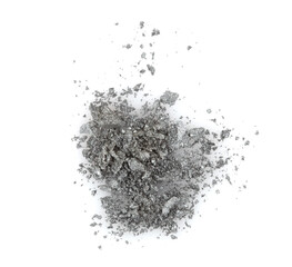 Fototapeta na wymiar Crumble and crushe pearl gray eyeshadows, powder. Broken cosmetics on white background..