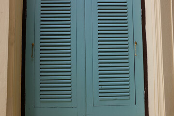 Fototapeta premium blue shutters on a window