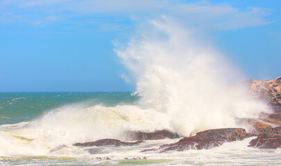Rocky coastline on Diaz Point with power sea wave - Luederitz, Namibia
