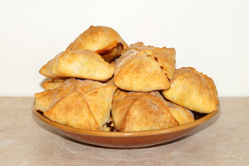 dish with ruddy baked pies, durtpochmaki, Tatar cuisine