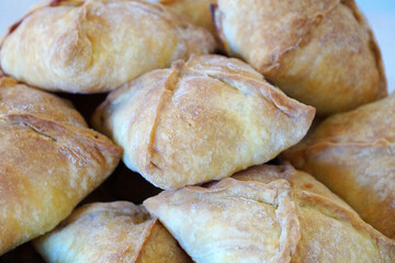ruddy baked pies close up, russian cuisine
