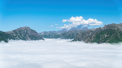 Fototapeta na wymiar Above the clouds scenery with peaks of mountains from Black sea karadeniz region highlands of Turkey