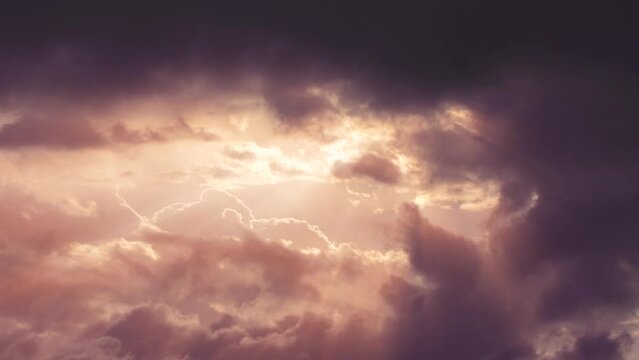 Dark dramatic sky with sun rays and ominous clouds for a melancholy atmosphere 