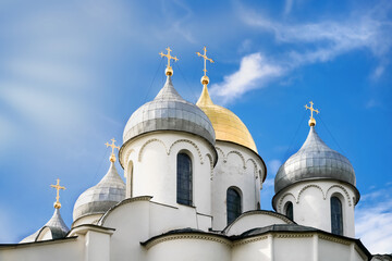 Fototapeta na wymiar The domes of the Orthodox Church against the blue sky. Russia