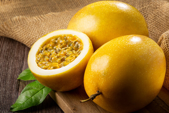 Yellow passion fruit sliced ​​on the table.