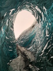 Iceland, ice cave hole trough to the top of the glacier.